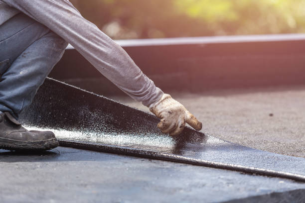 Professional Basement Waterproofing technician working in Brookhaven, GA